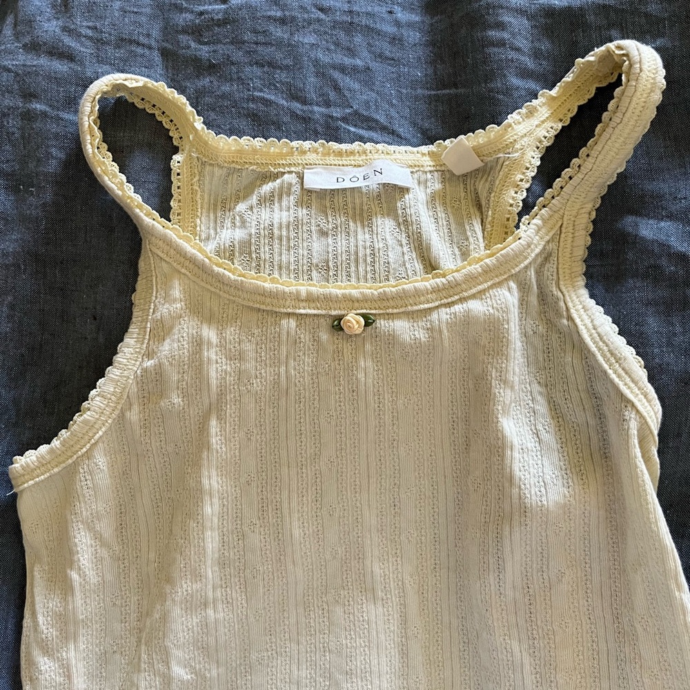 Doen pale yellow baby pointelle tank w/ little rose, worn a few times, no flaws